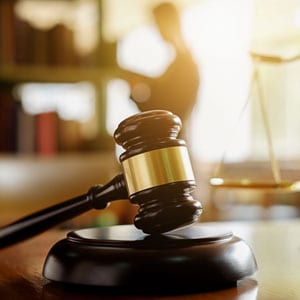 A judge gavel, symbolizing legal authority and justice - Maines Legal