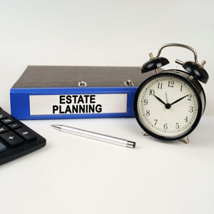 Estate planning binder and clock symbolizing timely strategies for Tennessee blended households.